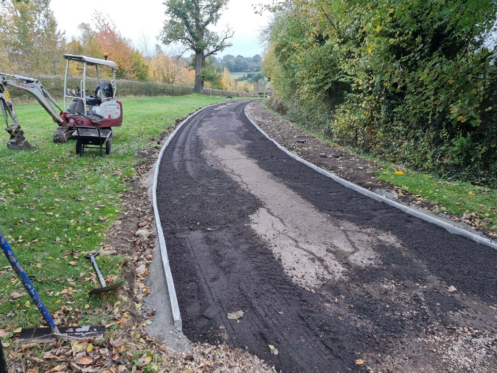 This is a large driveway which is in the process of having a tar and chip driveway installed on by Faversham Driveways